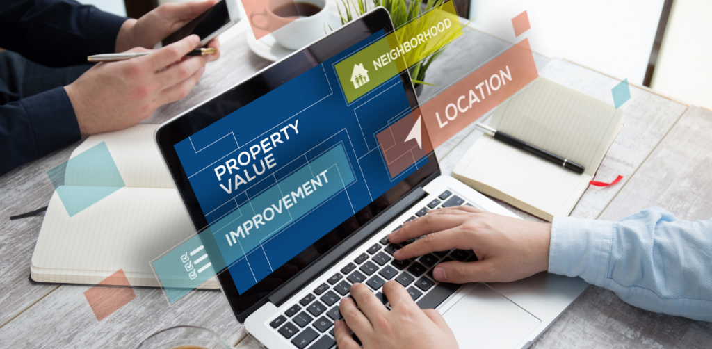 Laptop screen showing factors influencing real estate value—property improvement, location, and neighborhood